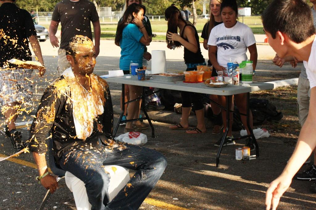 In Your Face


At the Diversity Club pie-throwing booth during the homecoming carnival, students line up to throw pies at chemistry teacher Jay Krishnan. The Carnival had booths ranging from pillow fighting to the car bash. At the time i was like I shouldnt have done it but, it was worth helping out the Diversity Club kids, Krishnan said. 