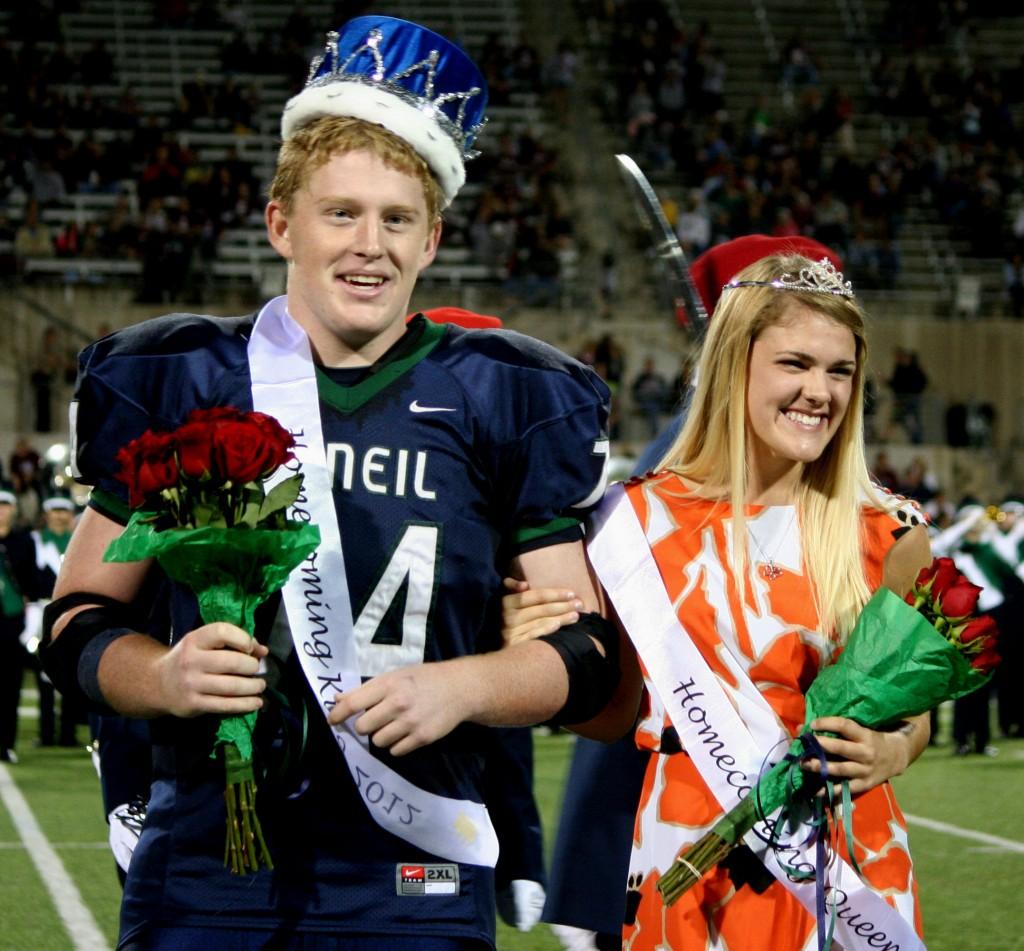 Maverick Royalty 


At the homecoming game seniors Spencer Pepper and Chole Dayton pose after being crowned homecoming king and queen. People in the stands cheered for them and a wave of excitement flowed over them. I didnt expect to win since my competitors were all pretty and popular, Dayton said, I was relieved and really happy to win. Thanks to all who voted for me.