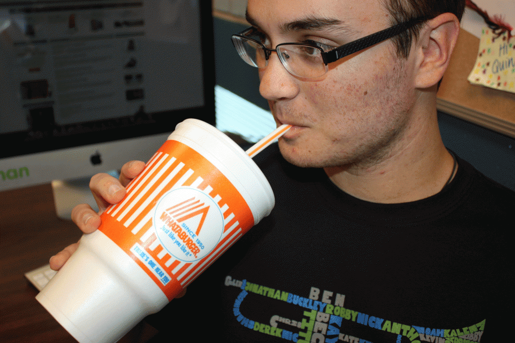 Senior Anthony Rodriguez enjoys a drink from Whataburger, a burger joint and local hangout for McNeil students.