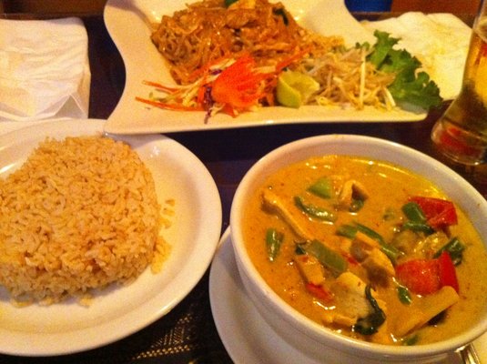 Pad Thai and Spicy Red Curry with a side of heart-shaped brown rice from Thai Cuisine. 