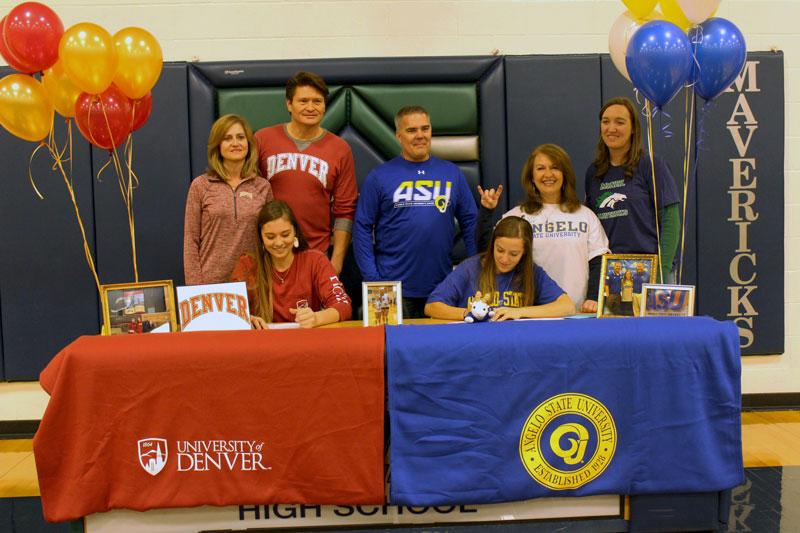 Seniors+Rebecca+Latham+and+Mallory+Davidson+sign+their+intents+to+play+volleyball+in+college