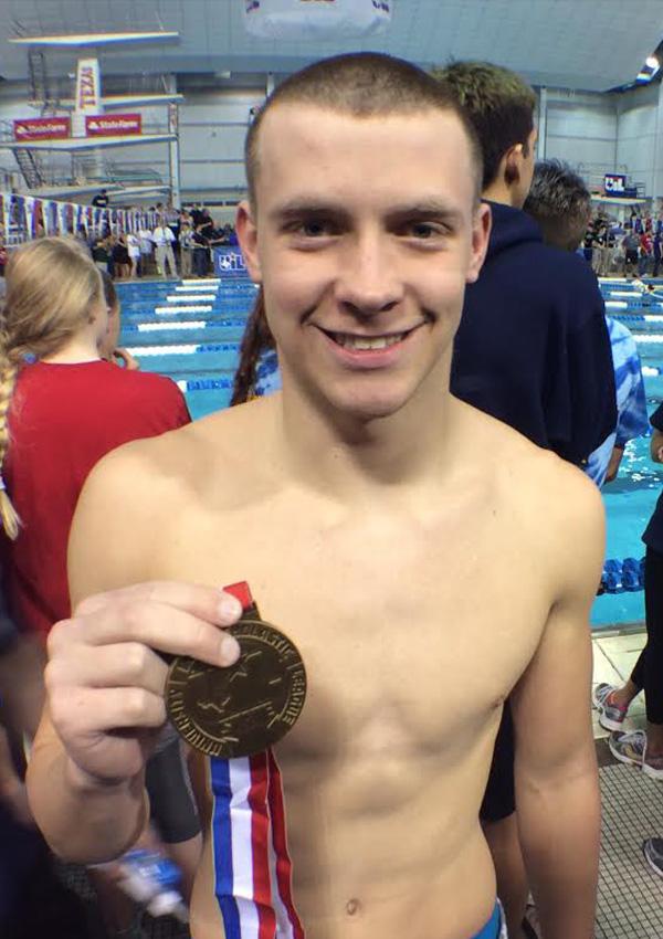 At+the+state+swim+meet%2C+senior+Ross+Sullivan+placed+third+in+the+100+free+while+also+gaining+success+with+his+relay.+