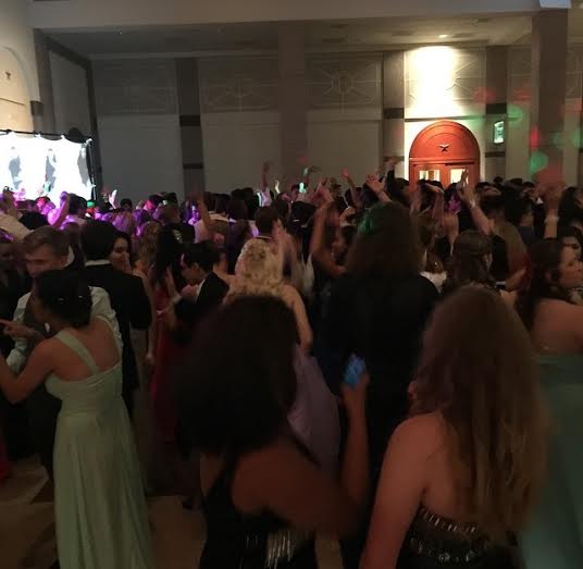 At the Bob Bullock museum, students dance at prom.