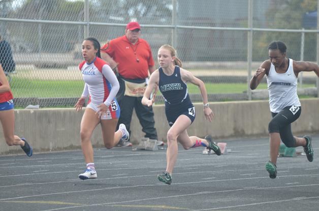 Freshman Julia Perry starts the 300 meter hurdle strong. Perry was one of nine members of the girls track team who advanced to the Regional Track and Field Meet at Baylor on April 29-30.