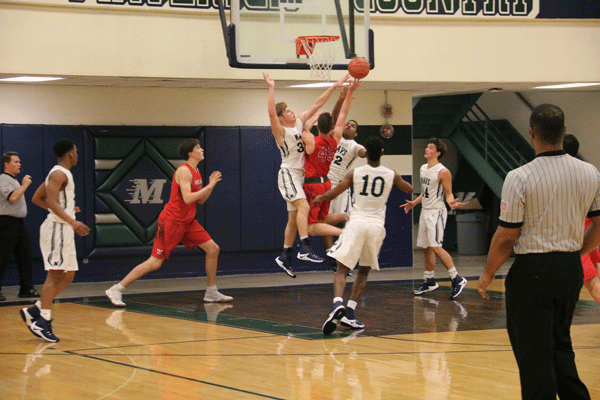 Varsity Mens basketball team won 71-58 against Westlake. 