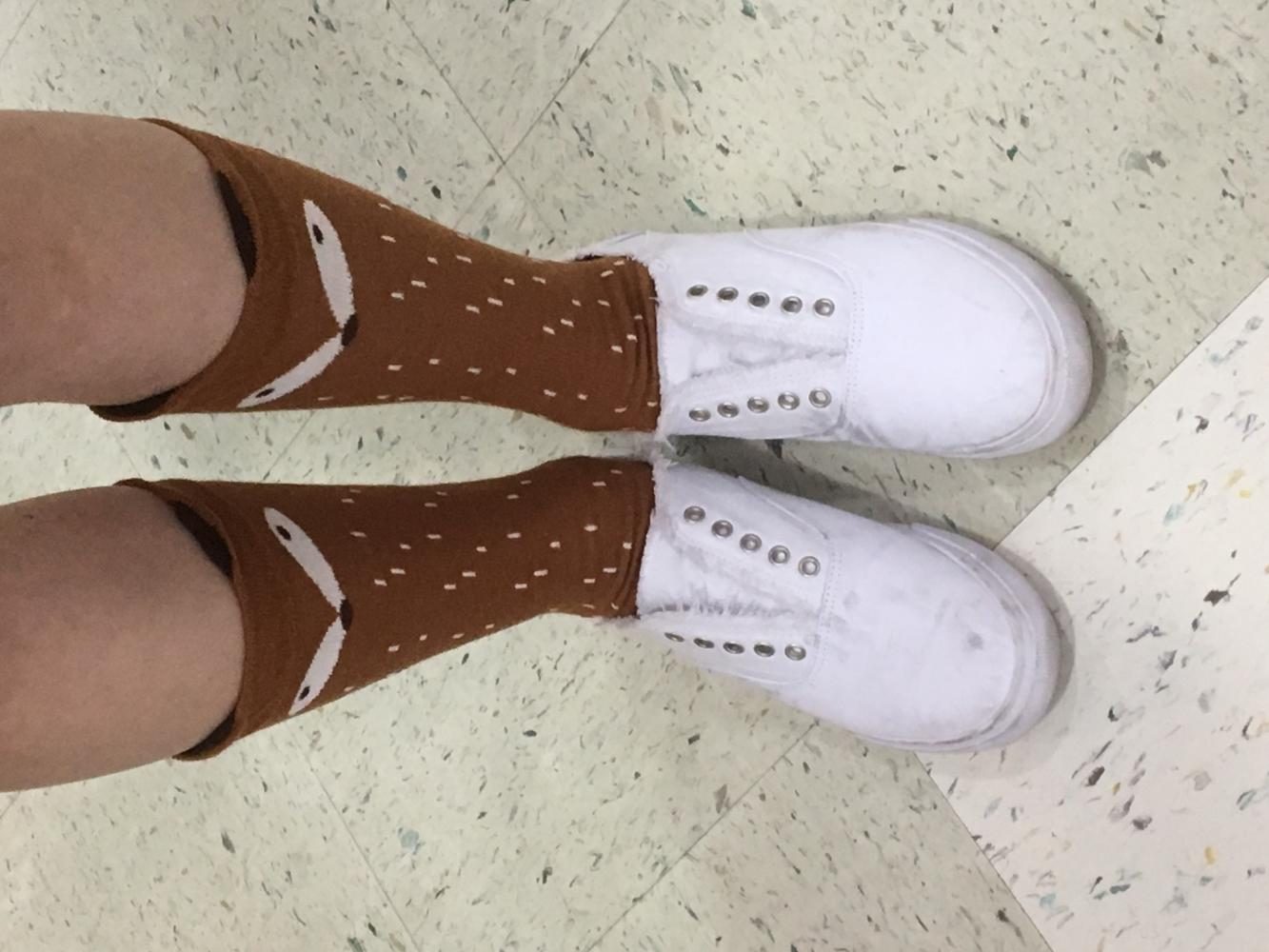 Freshman Alex Barker shows off her crazy socks for Welcome Week.