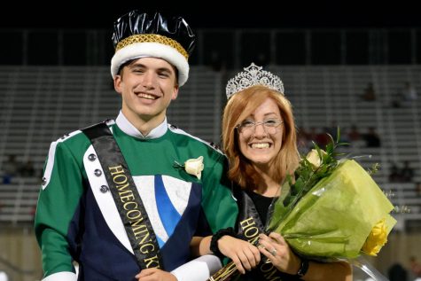 Seniors Jack Graves and Natalie Barnes pose for a picture after being crowned homecoming king and queen.
