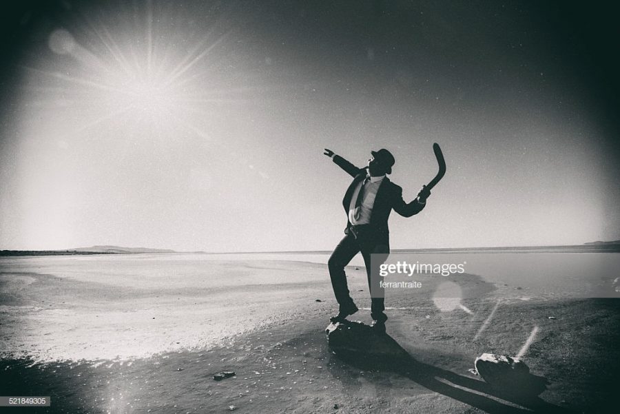 Businessman Tossing a Boomerang to the Sun. Investment and gain concept.