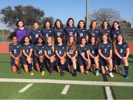 The girls pose for their team photo.