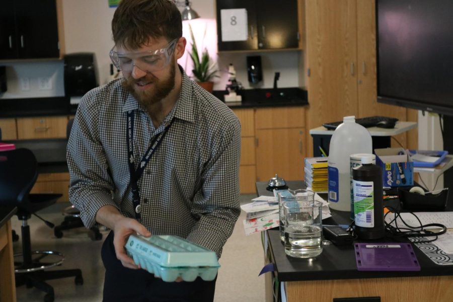Advanced and on-level biology teacher David Berry organizes and prepares the required materials for a science lab in his new classroom. At the beginning of the 2022-2023 school year, he moved to the F wing after not having a permanent room for three years.

 


“The part I like the most about my classroom are the windows,” Berry said. “The windows let in all the natural light and I’m such a plant person, so I got to bring in all my plants and incorporate more life into my lessons. I think that nature has a calming effect, so having these plants in the classroom has been calming.”
