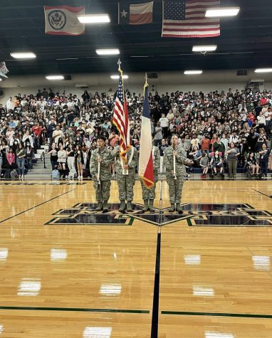 McNeil AFJROTC presents flags during the first pep rally of the school year. The students wore their required uniforms to do this. “I took JROTC because I thought it would help me attain a more disciplined life,” junior Hafsah Rahman said. “I like the before and after school activities they have because I think it really brings the whole class together.” 