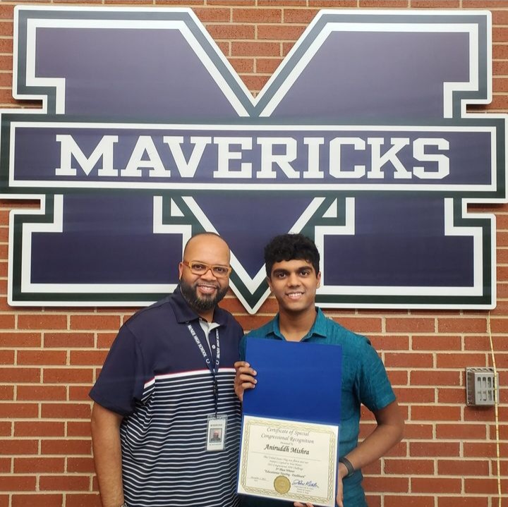 Principal Mack Eagleton [left] and senior Aniruddh Mishra [right] pose for a picture shortly after Aniruddh received his 2nd Place Certificate from the US Congressional App Challenge. 

“I think the challenge itself is amazing,” Aniruddh said. “Enroll in the challenge and create your own app. If you don’t know how to code, learn how to code. That’s my number one thing that I’d say to anybody because it’s one of the most important skills coming up in the modern world.”