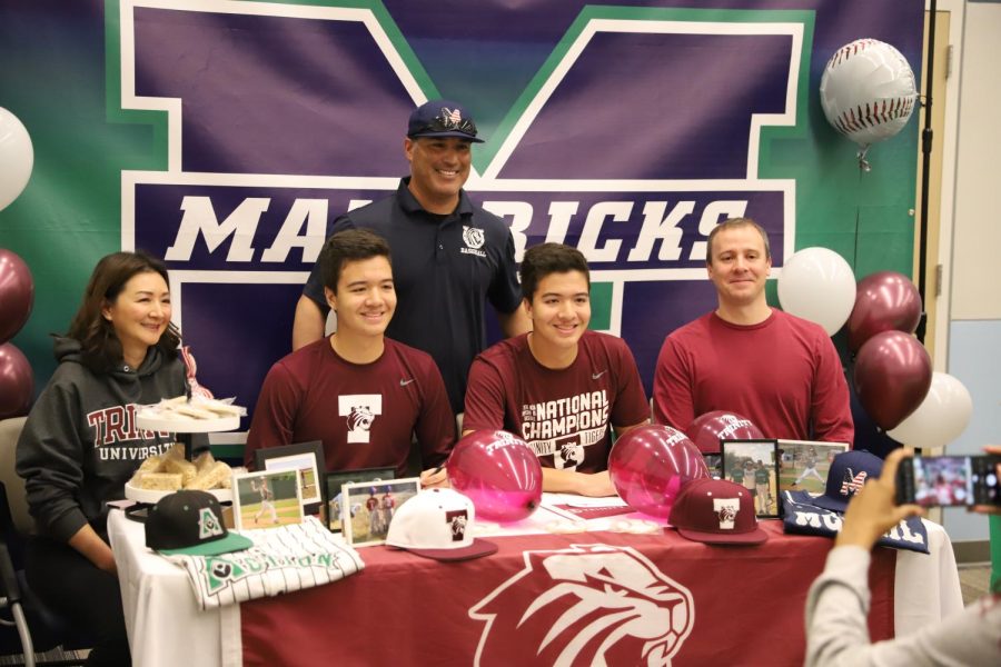 James and Brandon Morio pose for a photo shortly after signing to play Baseball for Trinity University. They were joined by their Varsity Baseball Coach Silver Aguirre and both of their parents. “Trinity was one of my dream schools back when I was really young,” Brandon said.  “When I was recruited, I was like ‘holy crap, this is a dream come true.’” 