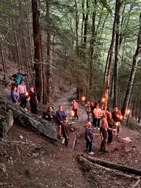 The group was just starting their hike down the mountain, lighting torches to stave off the creeping dark. The group had just traveled up the mountain during the last days of their trip to Europe. “It was the last day we were in Switzerland, we went up to a family-owned restaurant there and dined," Hannigan said. "When we finished up all the food and drink, we lit torches and walked down the mountain as it was getting dark.” 
