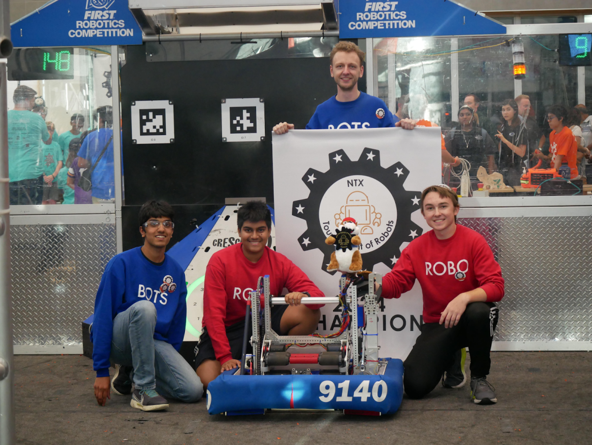  Junior Abhinav Devarakonda, junior Urjith Mishra, MHS teacher Gijs Landwehr, and senior Trent Bauman at NTX competition.