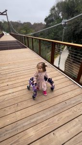 Bee Lofton walks with her walker.