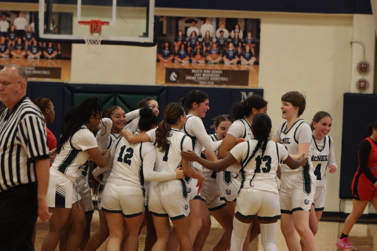 Boys and Girls Varsity Basketball Secure First District Win Against Manor