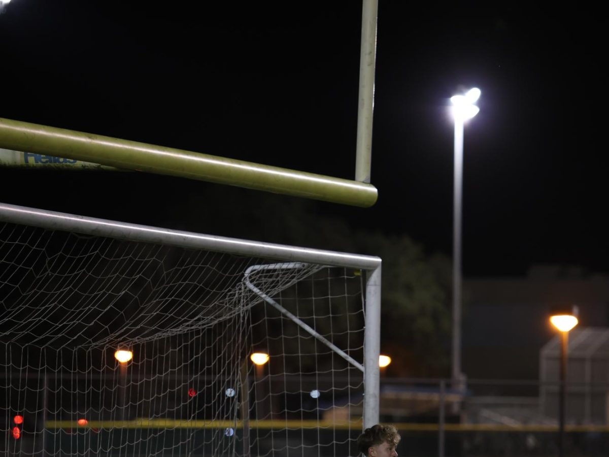 Daniel Puchalski blocks the opposing teams attempt to make an offensive play in the game against Vista Ridge on
Friday, Feb. 28. 