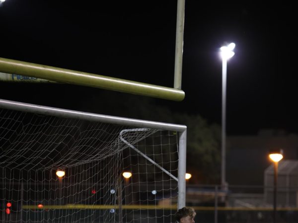 Daniel Puchalski blocks the opposing teams attempt to make an offensive play in the game against Vista Ridge on
Friday, Feb. 28. 