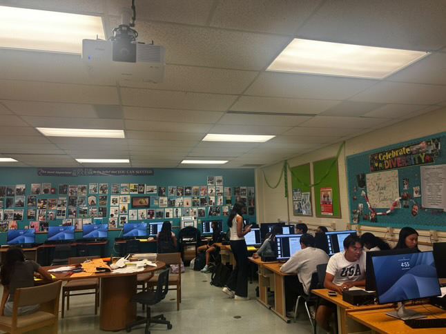 DECA members work on case studies and presentations during the chapter’s fall competition workshop.