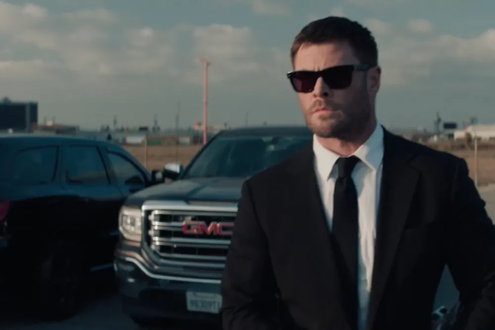 Actor Chris Hemsworth playing the protagonist of the movie, Mike Davis. Photo Courtesy of Variety