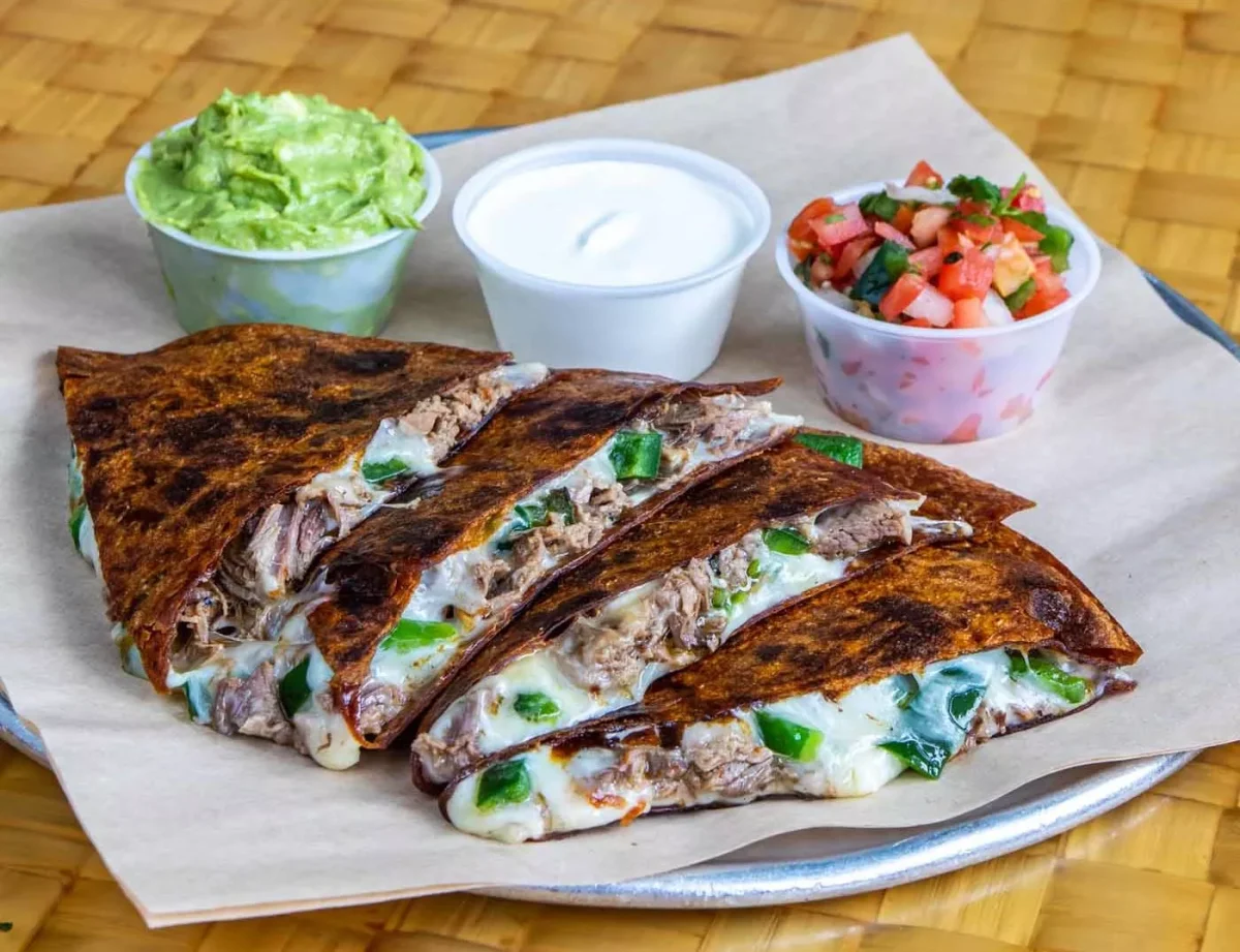 Cabo Bob's has a variety of food options from quesadillas to burritos and tacos. Displayed here are their quesadillas. Photo Courtesy of Cabo Bob's
