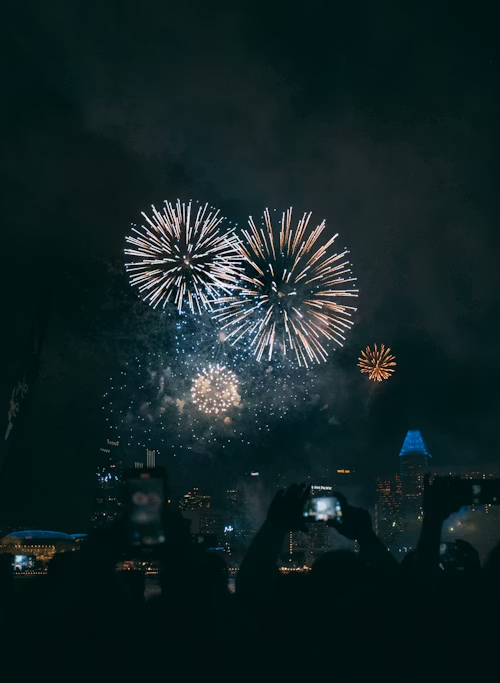 Celebrating New Years fireworks in Marina Bay, Singapore. Photo Courtesy of Unsplash 
