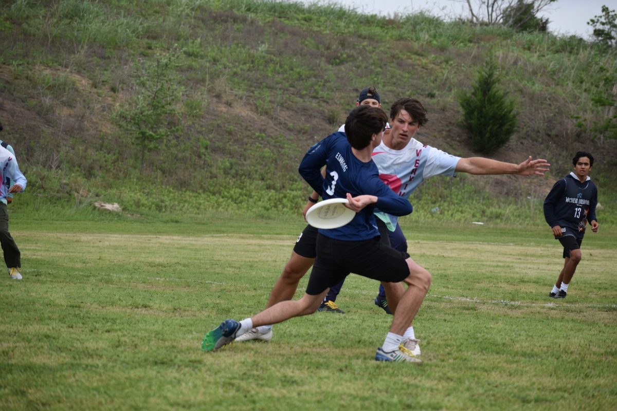 In a game against the Liberal Arts and Science Academy’s A-team, Senior Cormac Edmond has only seven seconds to throw the frisbee to one of his teammates.  